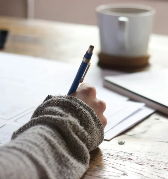 unseen-studio-s9CC2SKySJM-unsplash Person writing notes